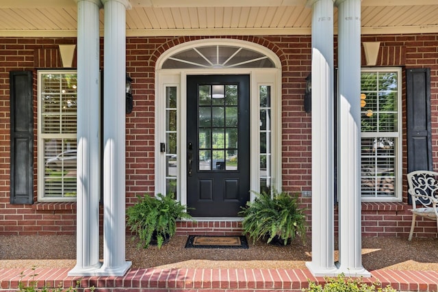 1209 Firth Ct, Franklin, TN 37067 - view of exterior entry featuring brick siding and covered porch