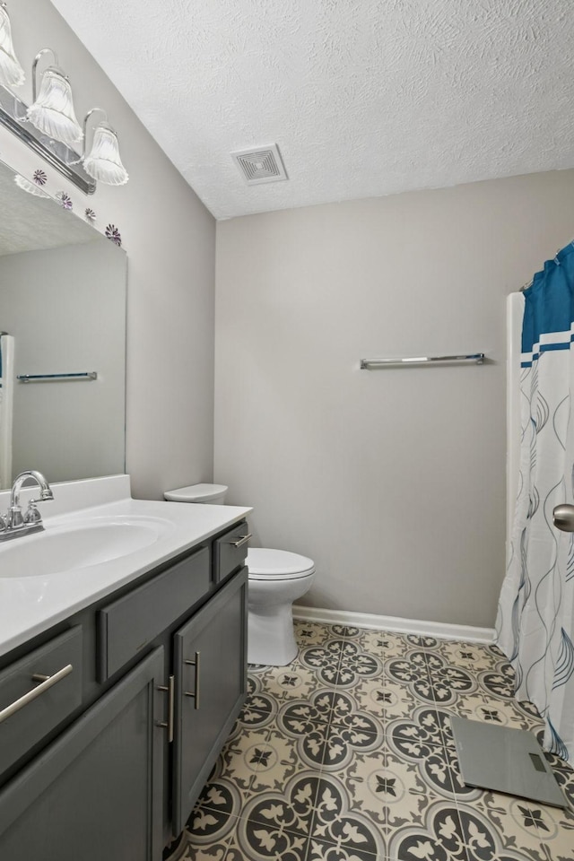 1804 Cason Trl, Murfreesboro, TN 37128 - full bathroom featuring vanity, a textured ceiling, tile patterned floors, and a shower with curtain