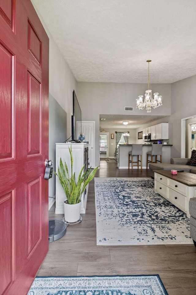 1804 Cason Trl, Murfreesboro, TN 37128 - entrance foyer featuring a chandelier and wood finished floors