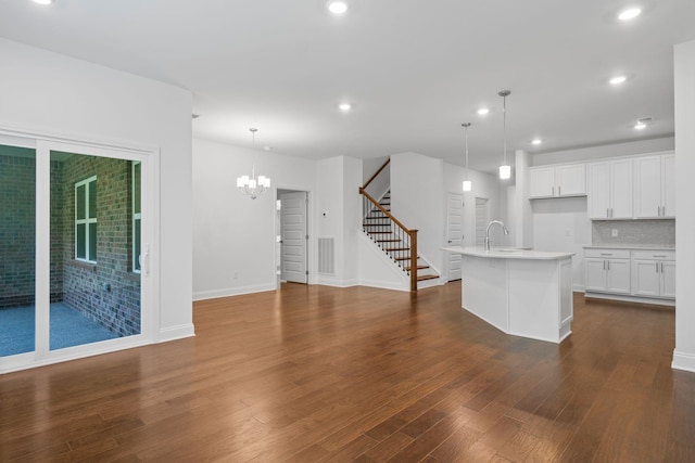 1551 Cedarbrooke Ln, Lebanon, TN 37090 - kitchen featuring dark wood-type flooring, light countertops, pendant lighting, and recessed lighting