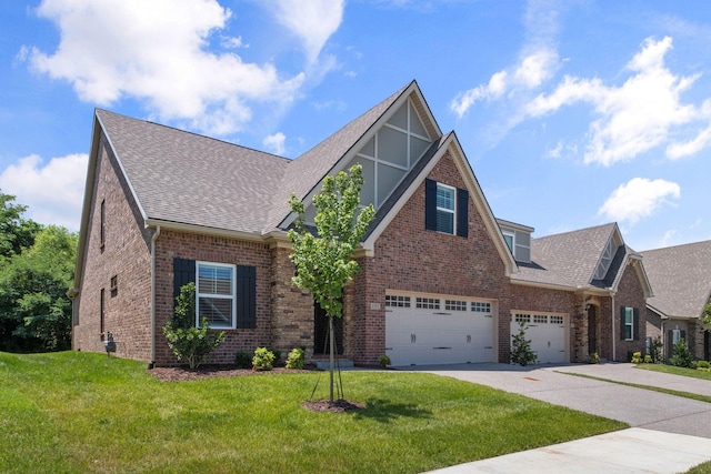 1551 Cedarbrooke Ln, Lebanon, TN 37090 - tudor home with brick siding, a shingled roof, a front yard, and driveway