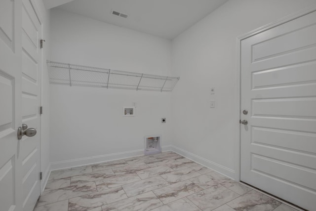 1551 Cedarbrooke Ln, Lebanon, TN 37090 - laundry room featuring light marble finish flooring, hookup for an electric dryer, and hookup for a washing machine