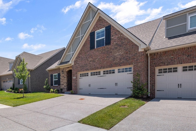 1551 Cedarbrooke Ln, Lebanon, TN 37090 - view of front facade featuring brick siding, driveway, a shingled roof, and a front lawn