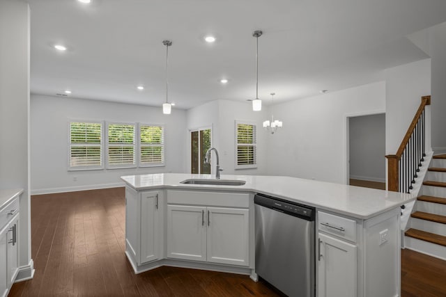 1551 Cedarbrooke Ln, Lebanon, TN 37090 - kitchen with stainless steel dishwasher, light countertops, white cabinetry, a chandelier, and dark wood-style flooring