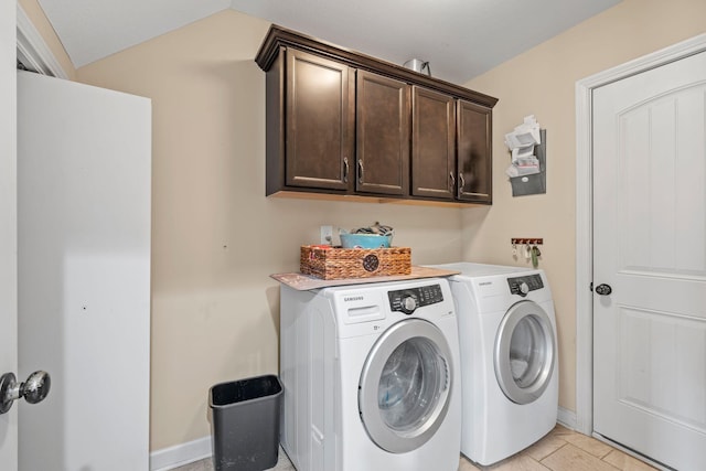 1372 Tidwell Switch Rd, Dickson, TN 37055 - washroom featuring cabinet space and washing machine and dryer