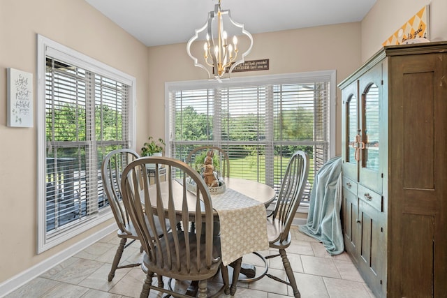 1372 Tidwell Switch Rd, Dickson, TN 37055 - dining room with a chandelier and baseboards