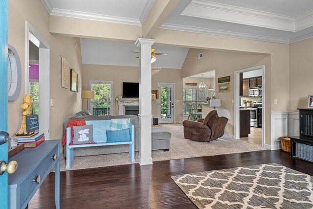 1372 Tidwell Switch Rd, Dickson, TN 37055 - living area with ceiling fan, wood-type flooring, a fireplace, ornamental molding, and vaulted ceiling
