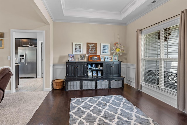 1372 Tidwell Switch Rd, Dickson, TN 37055 - sitting room featuring wood finished floors, a raised ceiling, a wainscoted wall, and ornamental molding