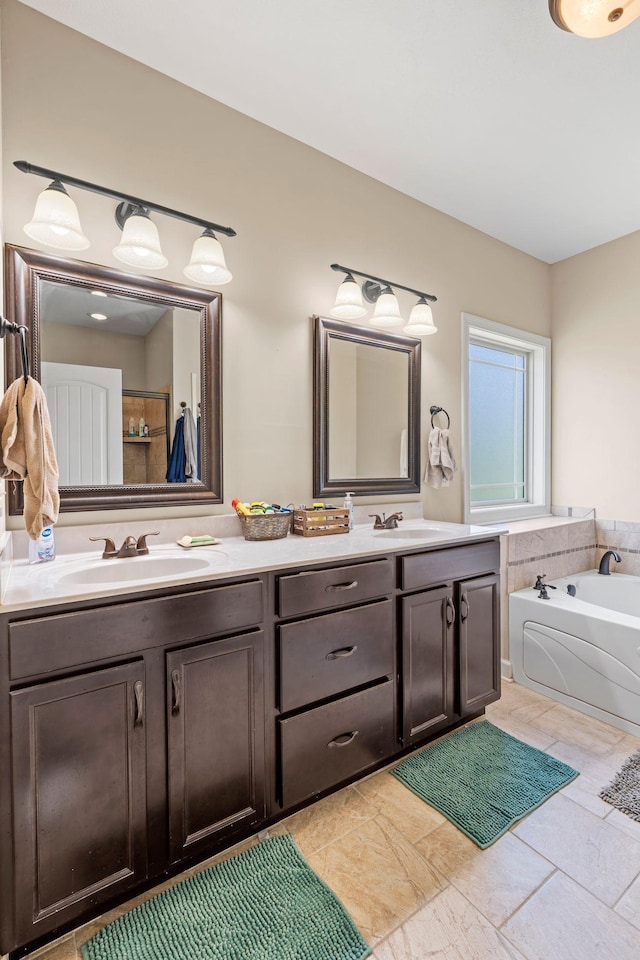 1372 Tidwell Switch Rd, Dickson, TN 37055 - bathroom featuring double vanity and a bath