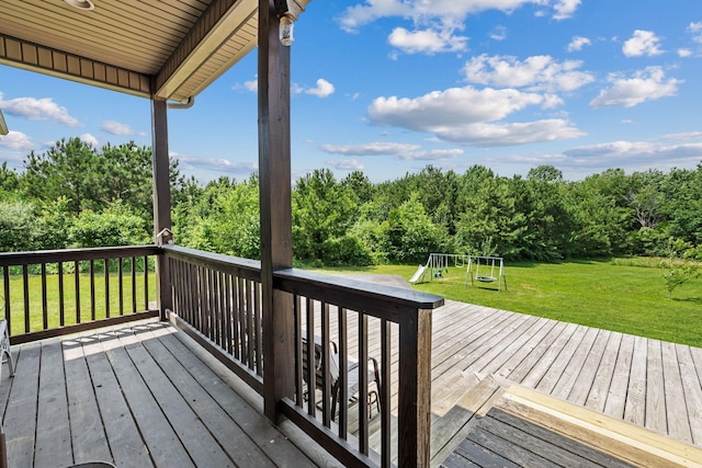 1372 Tidwell Switch Rd, Dickson, TN 37055 - wooden deck with a playground and a lawn