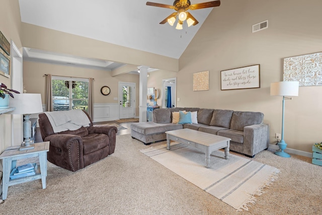 1372 Tidwell Switch Rd, Dickson, TN 37055 - carpeted living room featuring ornate columns, ceiling fan, wainscoting, and high vaulted ceiling