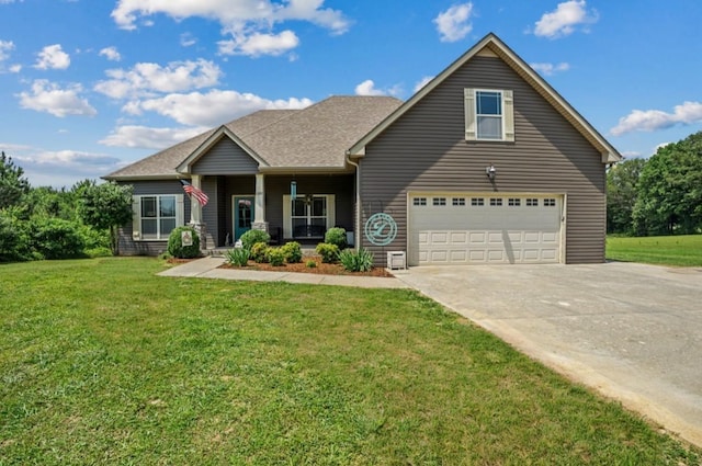 1372 Tidwell Switch Rd, Dickson, TN 37055 - view of front of home with a front yard, concrete driveway, a porch, and a garage