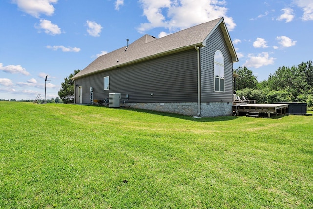 1372 Tidwell Switch Rd, Dickson, TN 37055 - back of property featuring crawl space, a lawn, and roof with shingles
