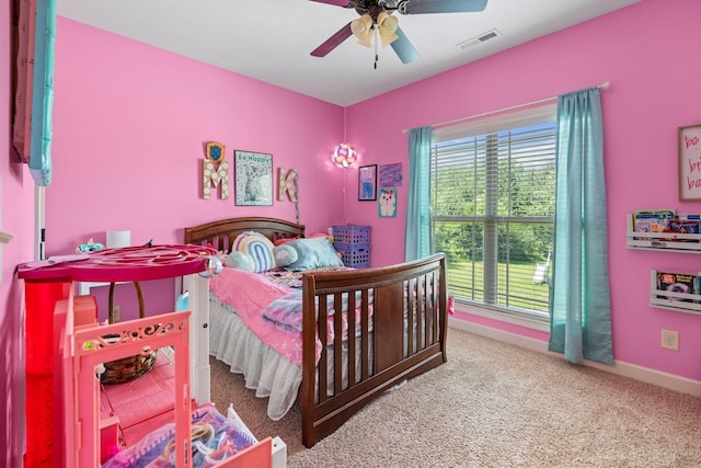 1372 Tidwell Switch Rd, Dickson, TN 37055 - carpeted bedroom with baseboards and ceiling fan