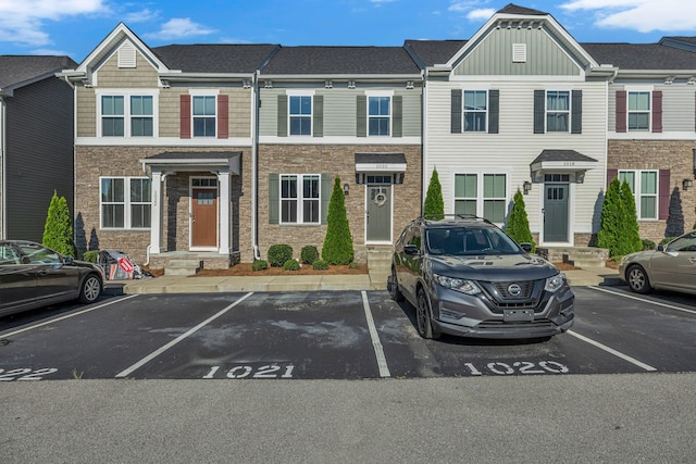 4316 Summercrest Blvd Unit 1020, Antioch, TN 37013 - view of property with uncovered parking, entry steps, and stone siding