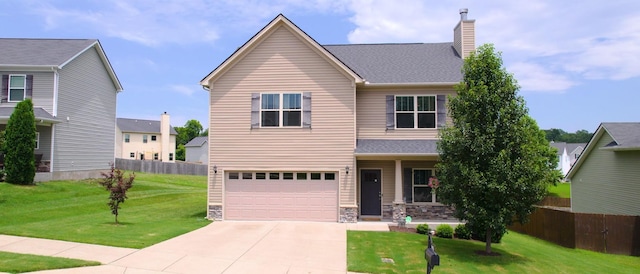 1095 Lady Nashville Dr, Hermitage, TN 37076 - view of front of house with driveway, an attached garage, a chimney, and stone siding