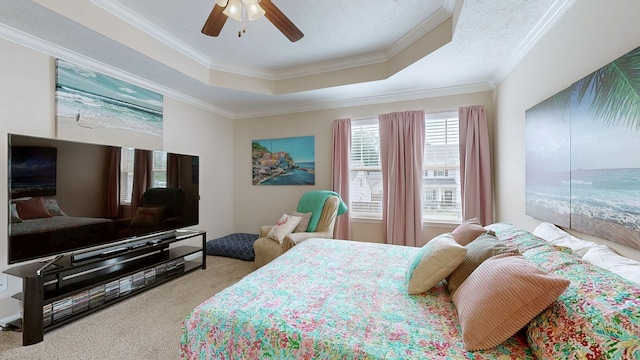 1095 Lady Nashville Dr, Hermitage, TN 37076 - carpeted bedroom featuring a tray ceiling, ornamental molding, and a ceiling fan