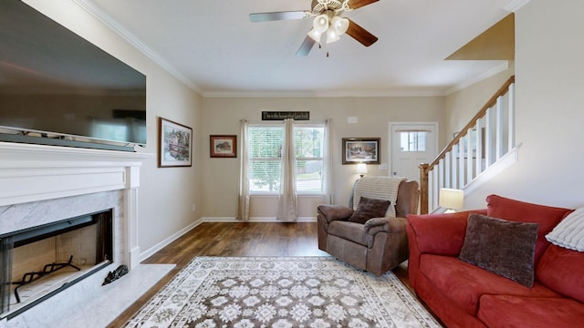 1095 Lady Nashville Dr, Hermitage, TN 37076 - living room featuring wood finished floors, ceiling fan, stairs, ornamental molding, and a high end fireplace