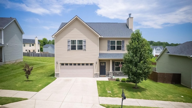1095 Lady Nashville Dr, Hermitage, TN 37076 - view of front of house featuring a chimney, a garage, driveway, stone siding, and covered porch