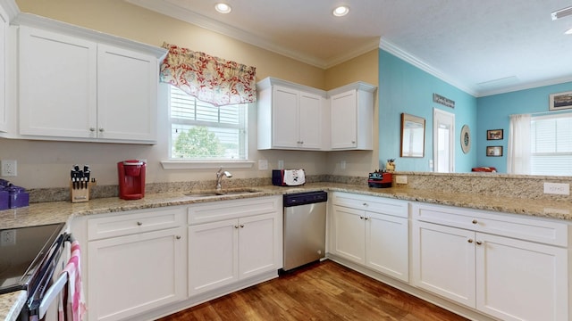 1095 Lady Nashville Dr, Hermitage, TN 37076 - kitchen featuring stainless steel appliances, wood finished floors, white cabinets, crown molding, and recessed lighting