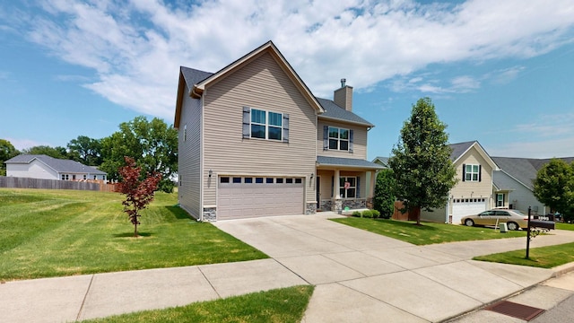 1095 Lady Nashville Dr, Hermitage, TN 37076 - traditional home with a chimney, driveway, a garage, and stone siding