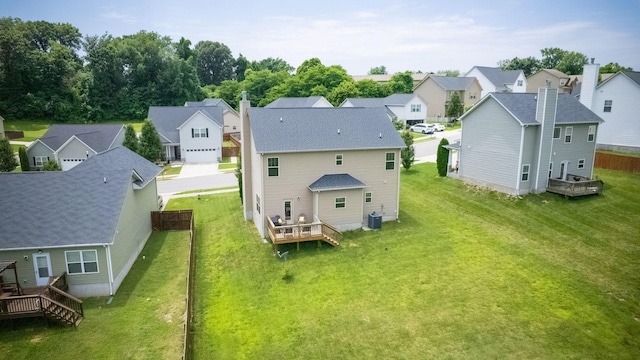 1095 Lady Nashville Dr, Hermitage, TN 37076 - rear view of house with a residential view, a deck, a chimney, and a yard
