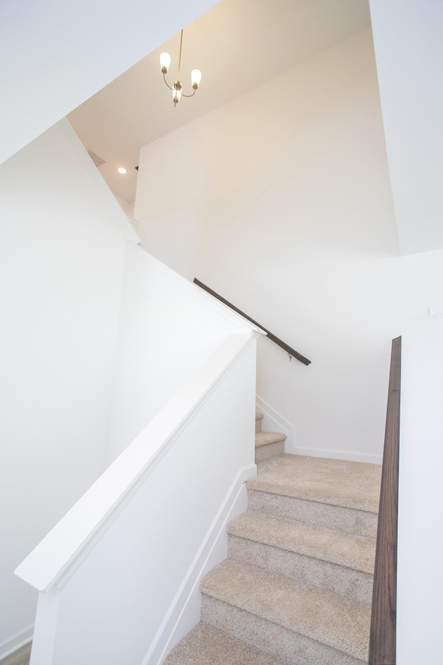 3044 Fernwood Ln, Columbia, TN 38401 - staircase featuring a chandelier, recessed lighting, and carpet