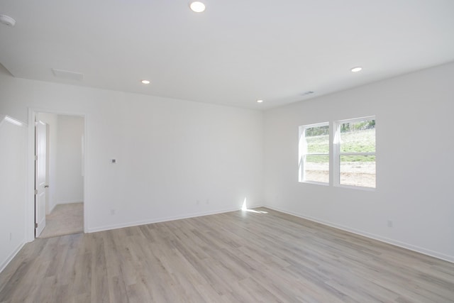 3044 Fernwood Ln, Columbia, TN 38401 - empty room with light wood-style floors, recessed lighting, and a smoke detector