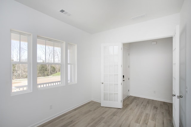3044 Fernwood Ln, Columbia, TN 38401 - spare room with light wood-type flooring and french doors