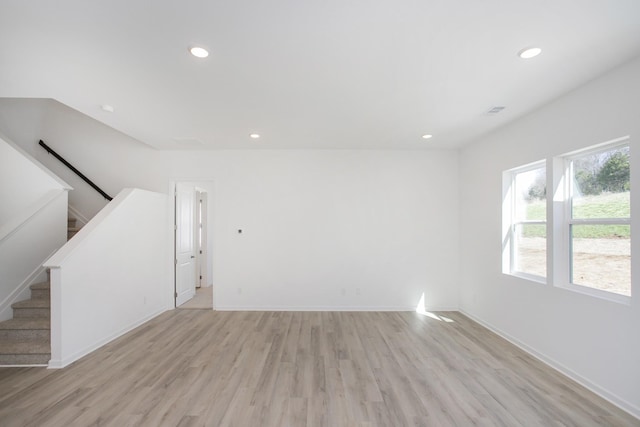 3044 Fernwood Ln, Columbia, TN 38401 - unfurnished living room with light wood-style flooring, recessed lighting, and stairs