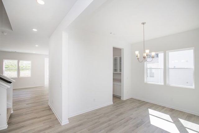 3044 Fernwood Ln, Columbia, TN 38401 - unfurnished dining area with a chandelier, light wood-type flooring, and recessed lighting