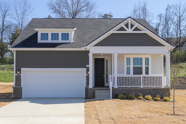 3044 Fernwood Ln, Columbia, TN 38401 - craftsman-style home featuring covered porch, concrete driveway, a garage, and roof with shingles