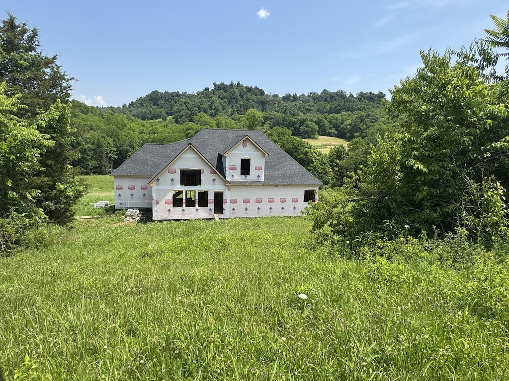 0 Opossum Paw Rd, Beechgrove, TN 37018 - rear view of property featuring a wooded view
