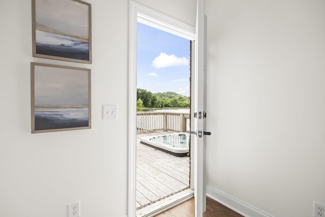 321 Lakeway Ter, Spring Hill, TN 37174 - doorway to outside featuring wood finished floors and a water view