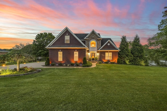 321 Lakeway Ter, Spring Hill, TN 37174 - view of front of house with a front yard and brick siding