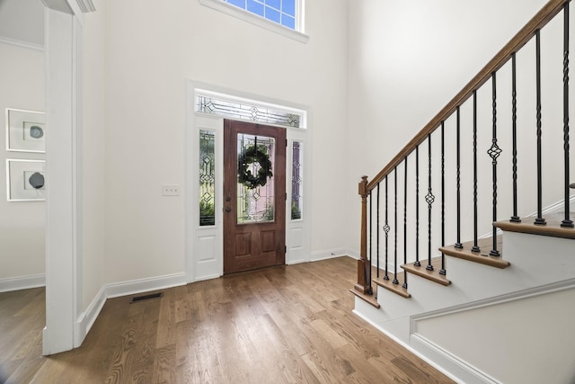 321 Lakeway Ter, Spring Hill, TN 37174 - entryway with wood finished floors, stairway, and a high ceiling