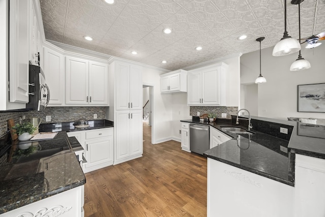 321 Lakeway Ter, Spring Hill, TN 37174 - kitchen featuring stainless steel appliances, an ornate ceiling, white cabinetry, dark wood-style flooring, and decorative backsplash