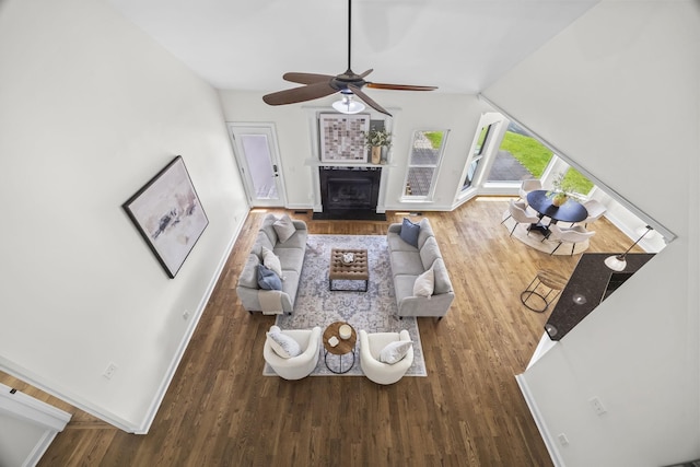 321 Lakeway Ter, Spring Hill, TN 37174 - living area featuring wood finished floors, ceiling fan, lofted ceiling, and a fireplace