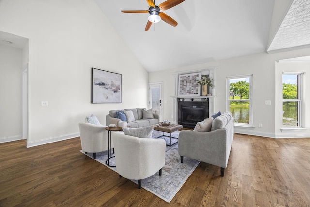 321 Lakeway Ter, Spring Hill, TN 37174 - living room with high vaulted ceiling, a ceiling fan, dark wood-type flooring, and a glass covered fireplace