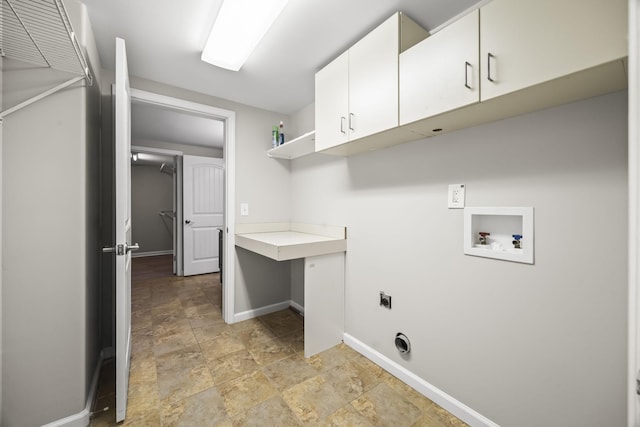 321 Lakeway Ter, Spring Hill, TN 37174 - laundry room featuring cabinet space, hookup for a washing machine, electric dryer hookup, and stone finish floors