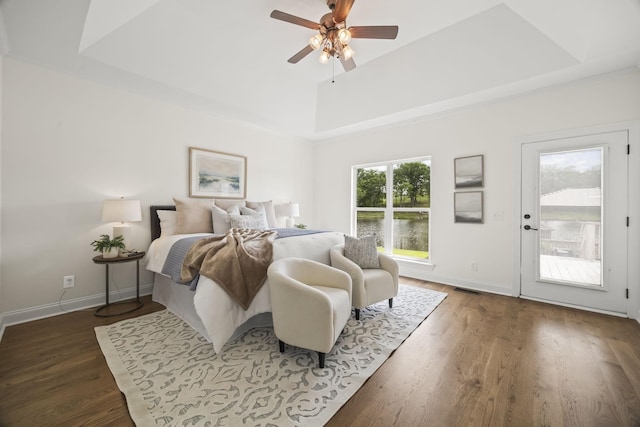 321 Lakeway Ter, Spring Hill, TN 37174 - bedroom with access to exterior, a raised ceiling, wood finished floors, and ceiling fan
