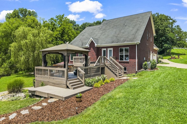 321 Lakeway Ter, Spring Hill, TN 37174 - view of front of property featuring a gazebo, an attached garage, a front yard, a deck, and driveway