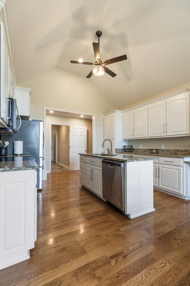 1057 The Long Run, Columbia, TN 38401 - kitchen with stainless steel appliances, a ceiling fan, white cabinets, lofted ceiling, and a center island with sink