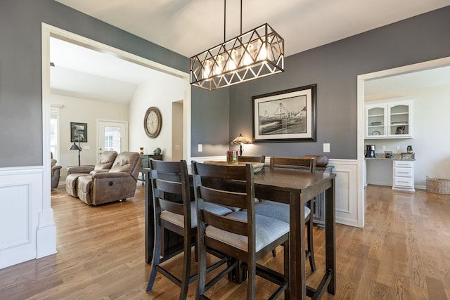 1057 The Long Run, Columbia, TN 38401 - dining area with wood finished floors, wainscoting, and a decorative wall