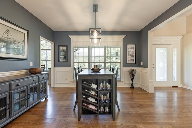 1057 The Long Run, Columbia, TN 38401 - dining room featuring a decorative wall, wainscoting, and dark wood finished floors