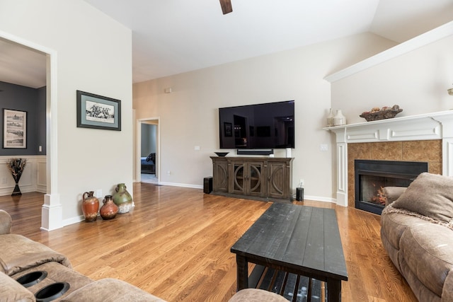 1057 The Long Run, Columbia, TN 38401 - living area with a fireplace, wood finished floors, and vaulted ceiling