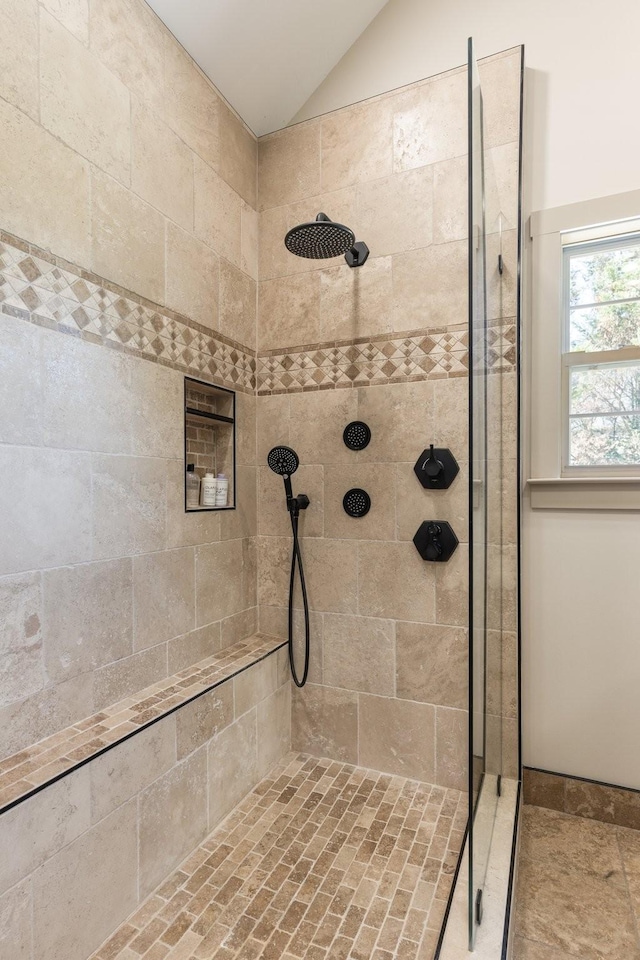 1057 The Long Run, Columbia, TN 38401 - bathroom featuring a tile shower and lofted ceiling