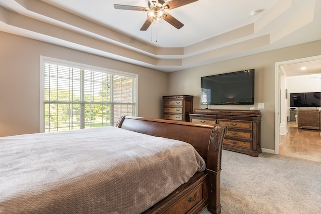 1057 The Long Run, Columbia, TN 38401 - bedroom with light carpet, a raised ceiling, and a ceiling fan