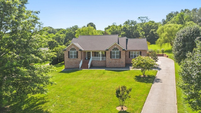 1057 The Long Run, Columbia, TN 38401 - ranch-style home featuring a front lawn, brick siding, and driveway