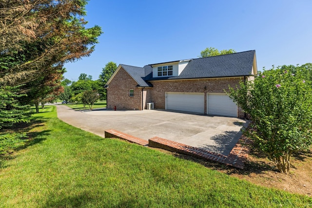 1057 The Long Run, Columbia, TN 38401 - view of home's exterior featuring brick siding, a yard, concrete driveway, an attached garage, and roof with shingles